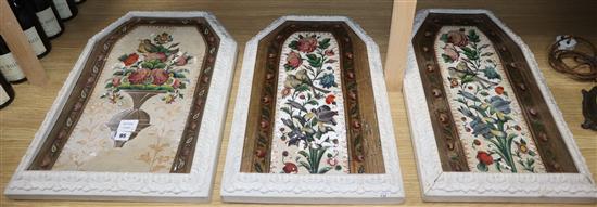 A set of three Qajar panels largest 58 x 42cm